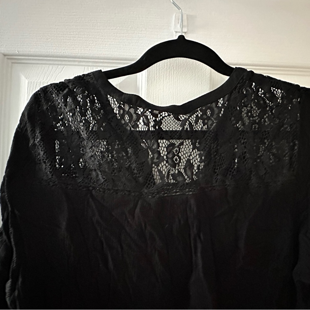 Rayon material long for leggings. Black with lace on back Reitmans